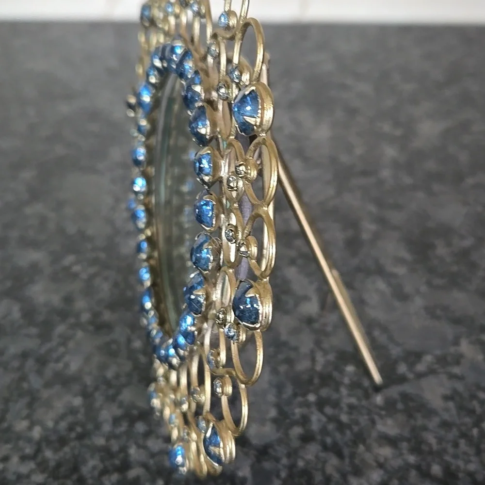 Gold Metal Round Frame Bedazzled with Blue Gem Stones